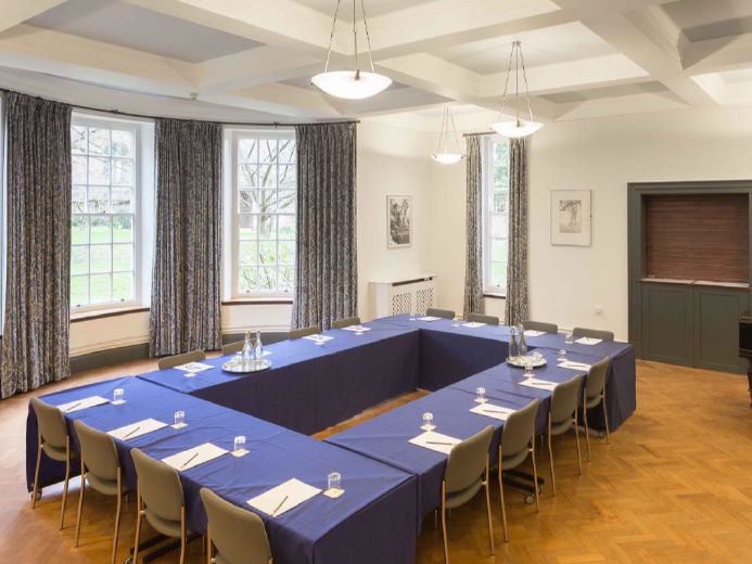 A U-shaped seminar table set up in the Mary O'Brien Room